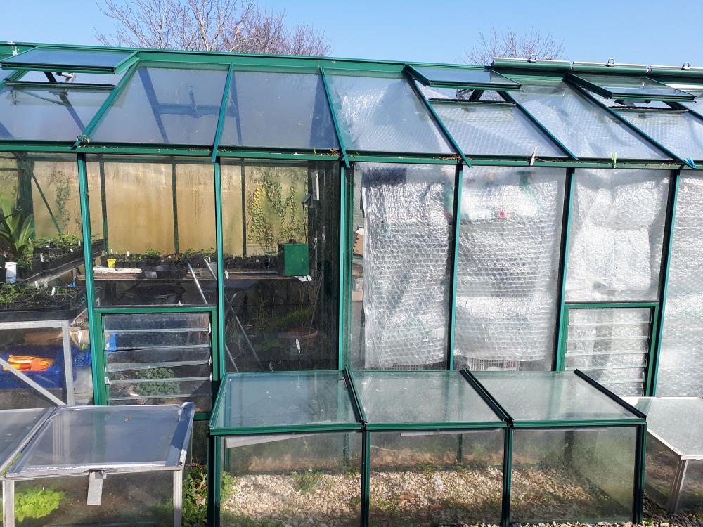 Remove greenhouse insulation