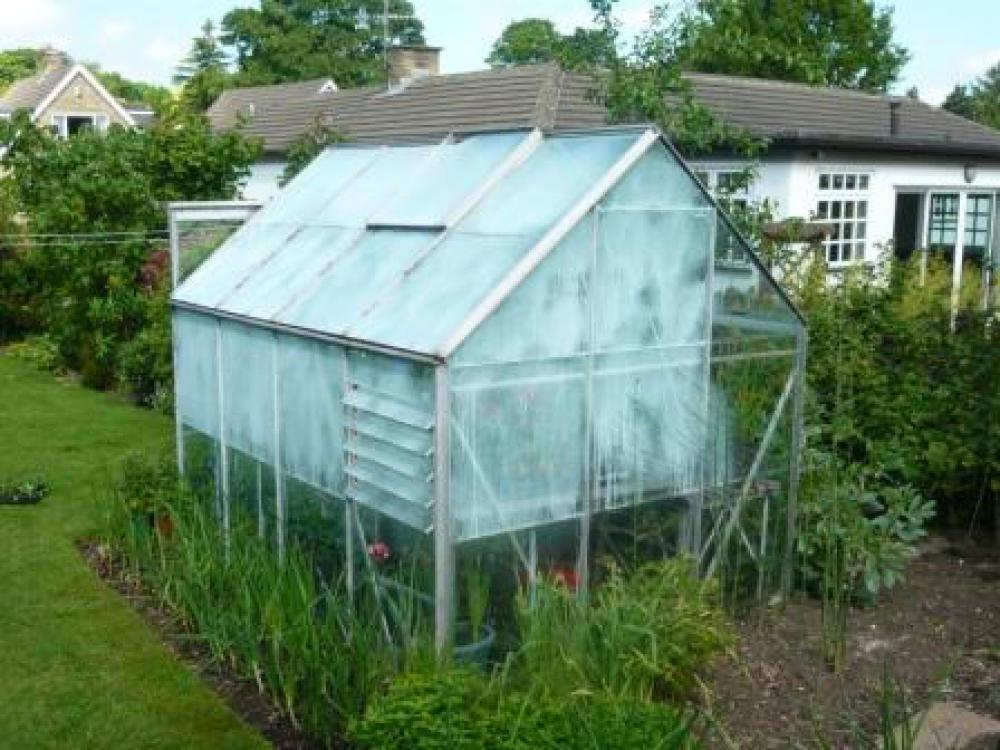 Use a shade paint on your greenhouse